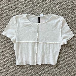 White exposed seam crop